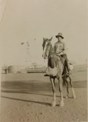 Blue, on his horse, Jimmy Boy, as a 19yo station hand at Beringarra Station